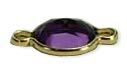 a purple stone in a wrap-tite setting